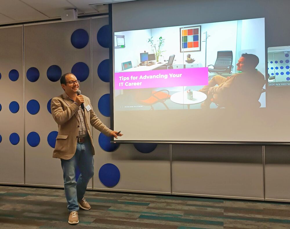 Javier giving a talk on tips for advancing an IT career